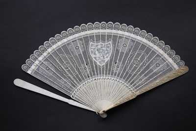 Lot 400 - A Fine Circa 1790's Chinese Carved and Pierced Ivory Brisé Fan, Qing Dynasty, the central...