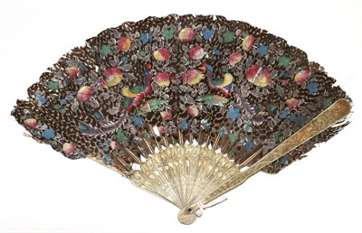 Lot 453 - A Chinese Carved Bone (?) Fan, Qing Dynasty, mounted with very dark feathers colourfully painted on