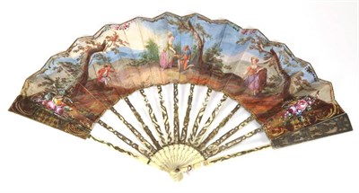 Lot 52 - The Proposal: An 18th Century Ivory Fan, with wide upper guards, both carved with a figure and...