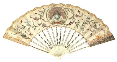 Lot 67 - The Peacock: An 18th Century Ivory Fan, the central feature a large peacock, his features and...