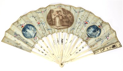 Lot 69 - A Mid-18th Century Bone Fan, with simple gilding to the upper guards and sticks, the monture...