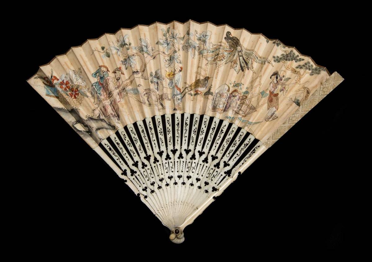 Lot 78 - A Circa 1700 or Earlier Very Slender Carved and Pierced Ivory Fan, the guards being lightly...