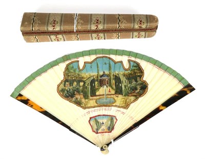 Lot 101 - An Early 19th Century (or earlier) Ivory Brisé Fan, with tortoiseshell guards. A central varnished