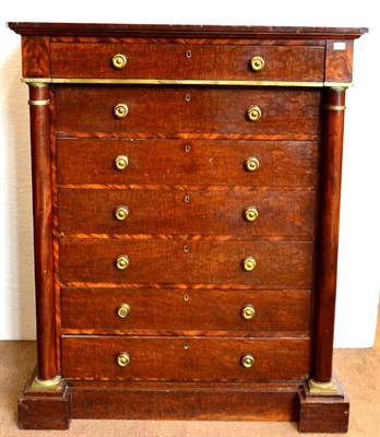 Lot 1074 - A 19th Century Mahogany and Brass Mount Semainier, the moulded top above seven drawers with...