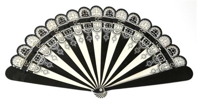 Lot 133 - A Circa 1880's Wood Brisé Fan, painted black or cream on alternate sticks, the tips and border...