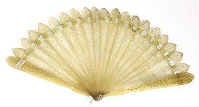 Lot 135 - An Early 19th Century Brisé Fan, in very pale horn, the nineteen inner sticks plus two guards with