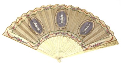 Lot 138 - An Early 19th Century Bone Fan, the guards and gorge simply carved and pierced with flowers....