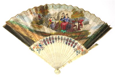 Lot 152 - An Unusual 18th/19th Century Ivory Fan, with a printed and hand coloured leaf. The guards are...