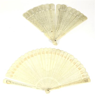 Lot 165 - An Early 19th Century Carved Bone Brisé Fan, the guards and sticks carved and pierced, all...