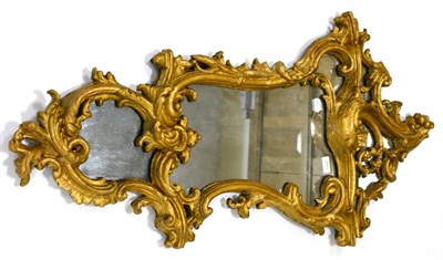 Lot 1093 - An 18th Century Gilt and Gesso Rococo Style Cartouche Shaped Pier Glass, the frame with...