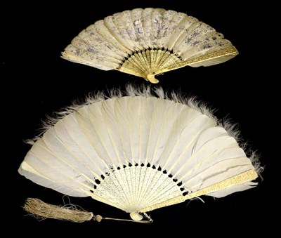 Lot 221 - A 19th Century Chinese Carved Ivory Fan, Qing Dynasty, mounted with plain white feathers tipped...