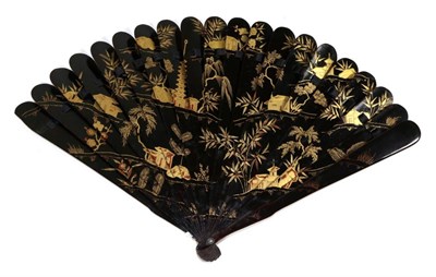 Lot 231 - A Circa 1840's Chinese Wooden Brisé Fan, Qing Dynasty, lacquered in black and gold with highlights