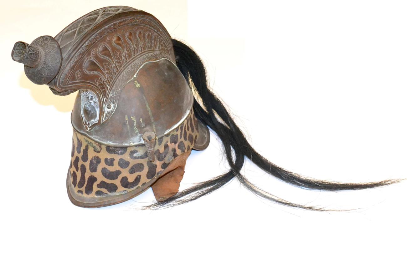 Lot 1 - A French Model 1845 Enlisted Man's Dragoon Helmet, in brass, the high comb embossed with...