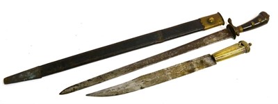Lot 34 - An Early 19th Century Continental Hunting Sword, the 46cm single edge tapering steel blade engraved