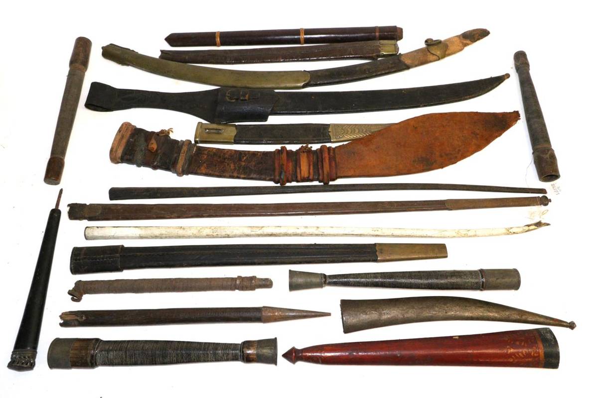 Lot 36 - A Quantity of Various European and Indonesian Scabbards, in wood and leather, including swords,...