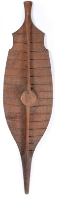 Lot 39 - A 19th Century Nias War Shield, Sumatra, of light Sagow wood reinforced with horizontal bands...