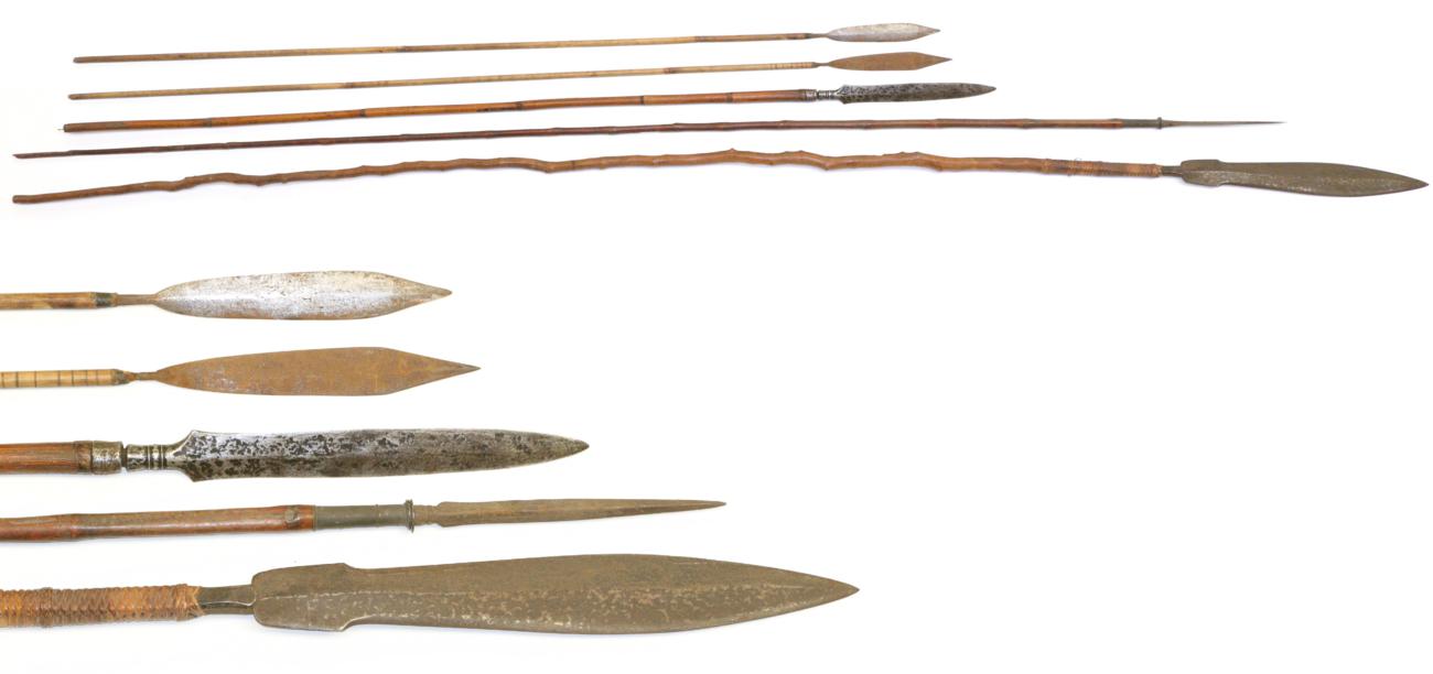 Lot 49 - A Late 19th Century Indonesian Spear, with large leaf shape head, the tang bound to the...