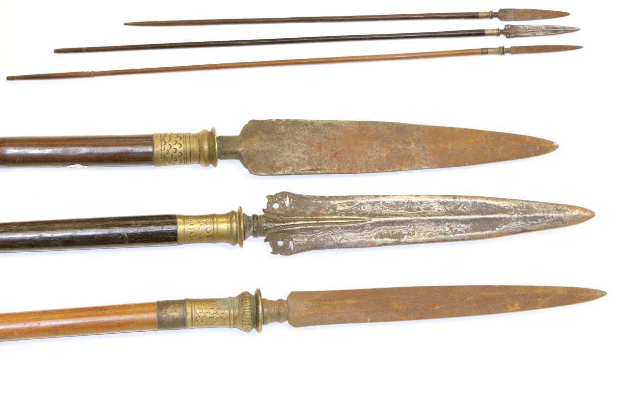 Lot 54 - Three 19th Century Indonesian Spears, each with leaf shape blade, one with pierced wings, the tangs