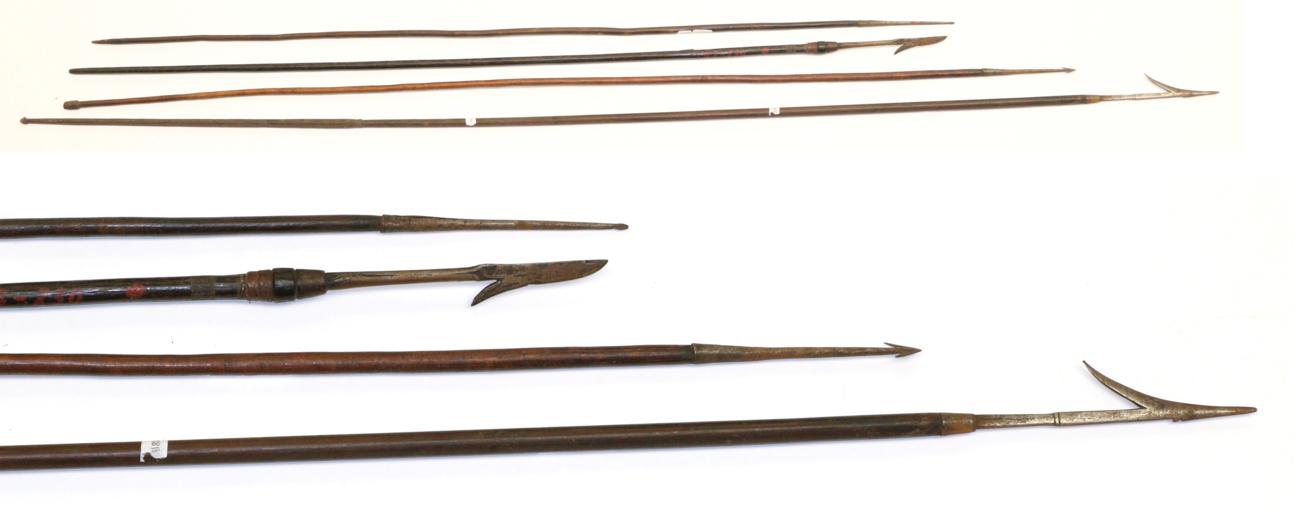 Lot 55 - Two 19th Century Indonesian Spears, East Timor, each with narrow blade with barb to one side,...