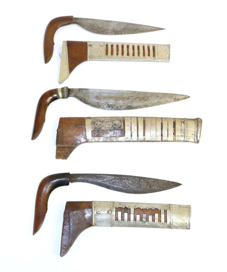 Lot 86 - Three Early 20th Century Badeks, Sulawesi, each with straight back curved edge steel blade,...