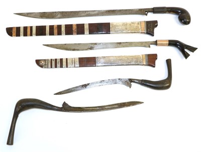 Lot 87 - An Early 20th Century Rawit, Sumatra, with 33cm straight back curved edge steel blade, copper...