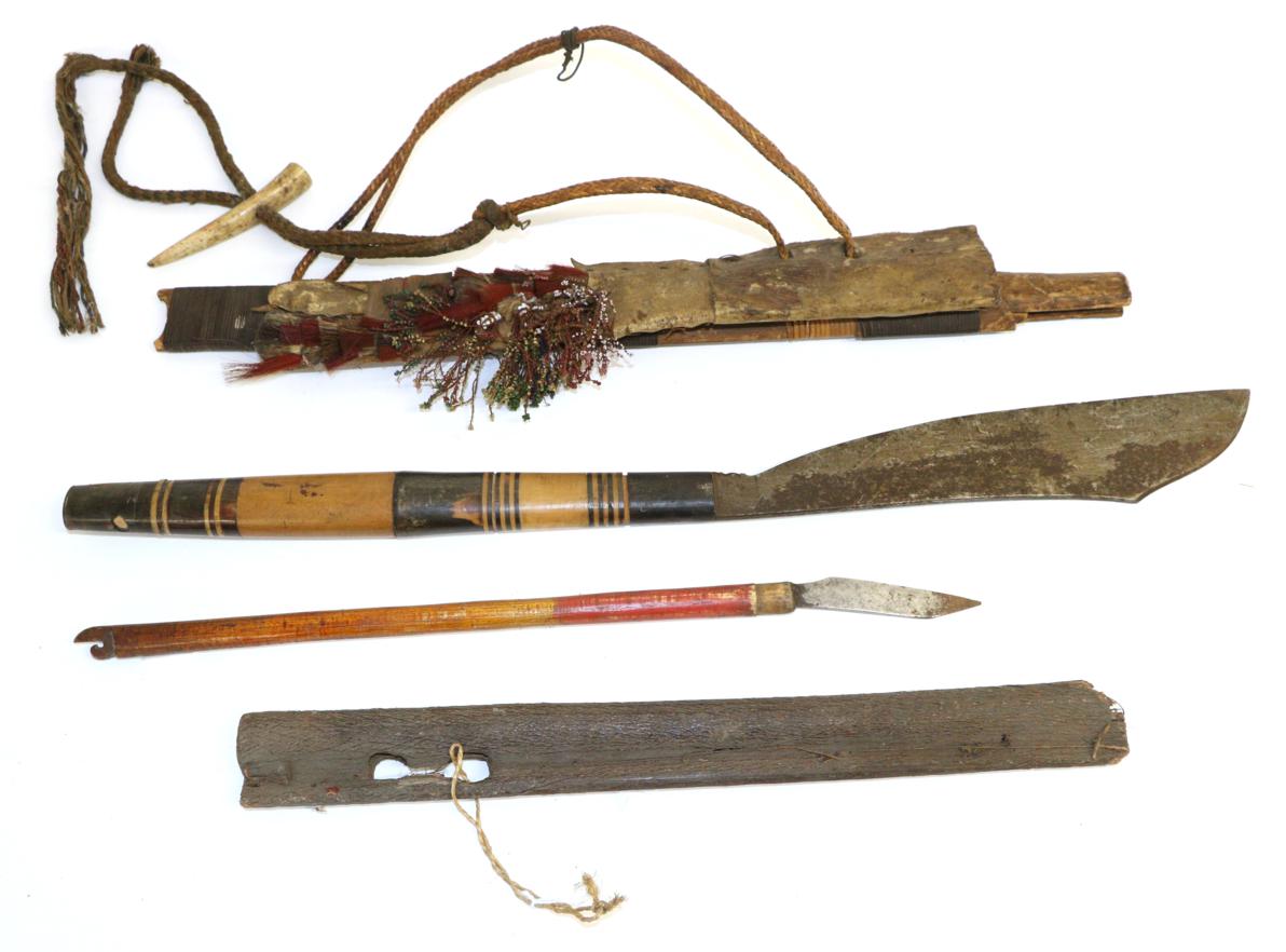 Lot 89 - An Early 20th Century Stick Sword, South-East Sulawesi, with broad 30cm clip-point steel blade...