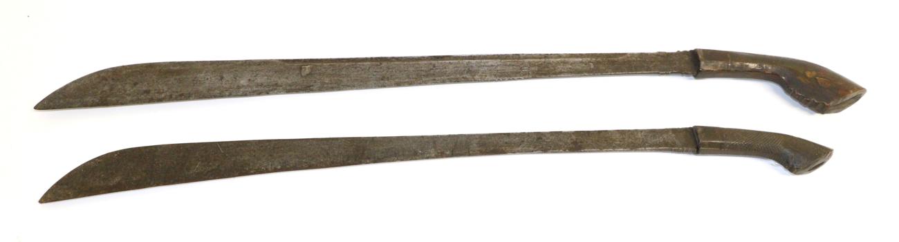 Lot 93 - A 19th Century Sumatran Rudus (Klewang), the 64.5cm single edge broad steel blade widening at...