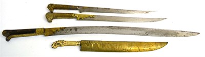 Lot 113 - A 19th Century Ottoman Yataghan, the 52cm curved single edge steel blade with punched mark and...