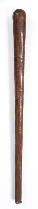 Lot 116 - A 19th Century Fijian Pole Club, of dense hardwood, with rounded tip and small swollen butt,...