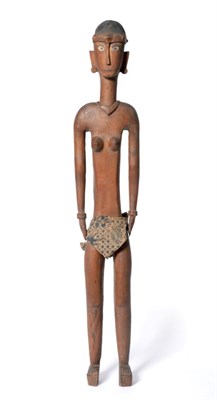 Lot 124 - A 19th/20th Century Indonesian Carved Wood Hampatong Type Figure, of a woman, standing with...