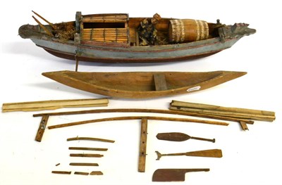 Lot 134 - An Indonesian/Philippino Wood Model of a Fishing Boat, with figure of a fisherman, oars,...