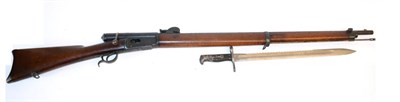 Lot 162 - A Swiss Vertelli Model 1878 Bolt Action Repeating Rifle, the 84cm blackened barrel, with hinged...