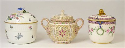 Lot 18 - A Meissen Porcelain Sugar Bowl and Cover, circa 1750, painted with flower sprigs within ozier...