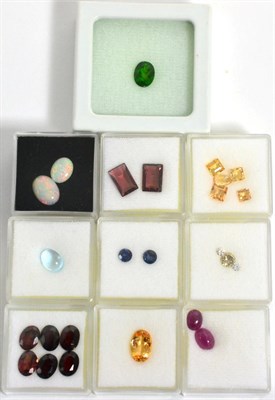 Lot 3006 - A Quantity of Loose Gemstones, including three round brilliant cut diamonds, two cabochon...