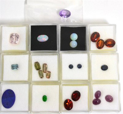 Lot 3007 - A Quantity of Loose Gemstones, including an amethyst, three opals, five citrines, four...