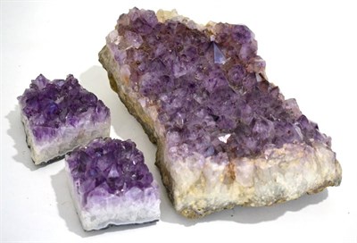 Lot 3026 - A Large Display Amethyst Specimen, Brazil and A Pair of Amethyst Bookends (3)