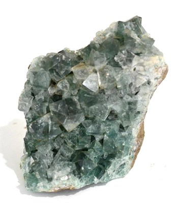 Lot 3067 - A Display Specimen of Green Fluorite, with inter-penetrant twinned crystals, from the Heights Mine