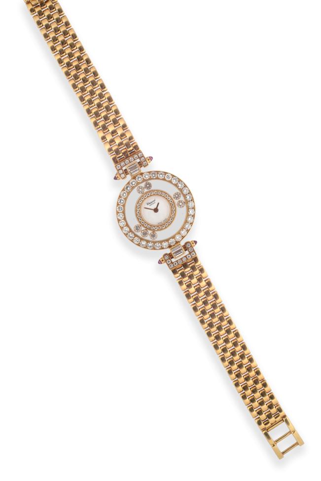 Lot 97 - A Fine Lady's 18ct Gold Diamond Set Wristwatch, signed Chopard, Geneve, model: Happy Diamonds,...