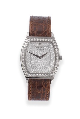 Lot 98 - A Tonneau Shaped 18ct White Gold Diamond Set Wristwatch, signed The Royal Diamond, circa 2005,...