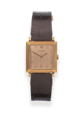 Lot 99 - An 18ct Gold Wristwatch, signed Boucheron, circa 1970, lever movement signed Ulysse Nardin and...