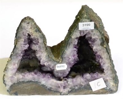 Lot 3199 - An Amethyst Double Cave, Brazil, 27cm high