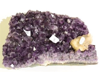 Lot 3200 - An Amethyst With Calcite, from Minas Gerais, Brazil, 39cm by 32cm