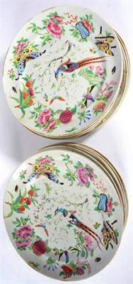 Lot 12 - A Set of Fourteen Cantonese Porcelain Dinner Plates, mid 19th century, painted in famille rose...