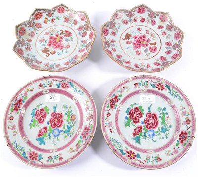 Lot 27 - A Pair of Chinese Porcelain Plates, Yongzheng/Qianlong, painted in famille rose enamels with...