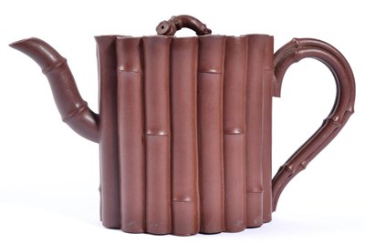 Lot 30 - A Yixing Stoneware Teapot and Cover, of oval section modelled as a bound bamboo, with similar spout