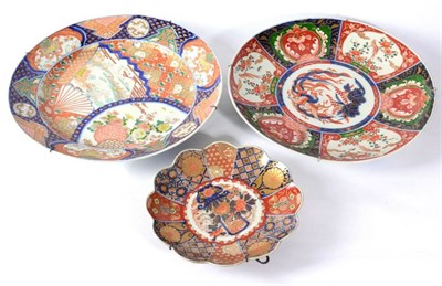 Lot 50 - An Imari Porcelain Dish, Meiji period, of fluted circular form, typically painted with a basket...