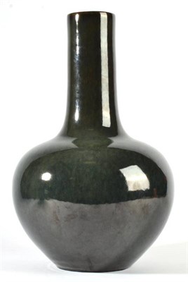 Lot 53 - A Chinese Porcelain Bottle Vase, Kangxi reign mark but not of the period, with mottled green...