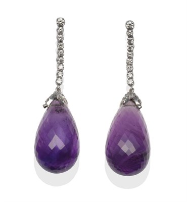 Lot 162 - A Pair of 18 Carat White Gold Amethyst and Diamond Earrings, a row of round brilliant cut...