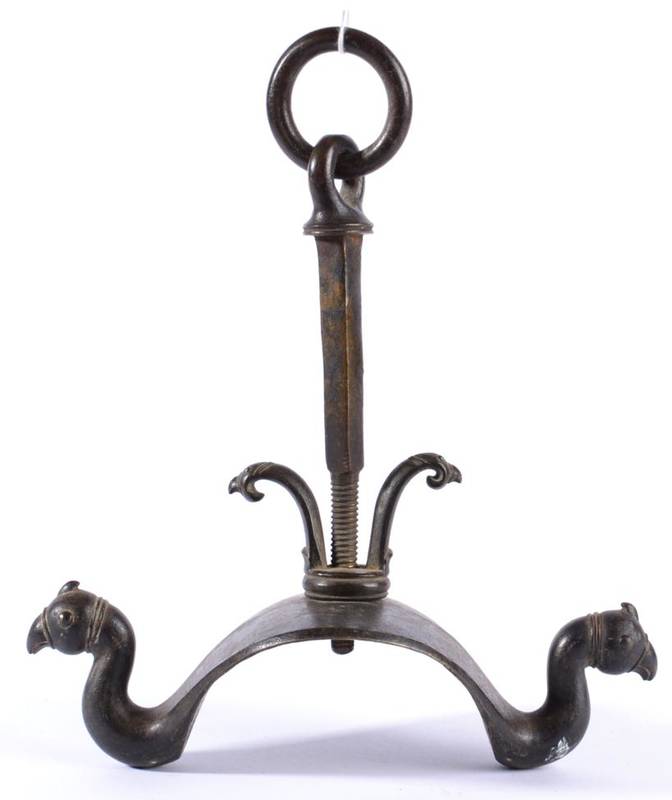 Lot 66 - A Bronze Bracket, possibly Indian, 17th/18th century, with suspension loop and scroll branches...