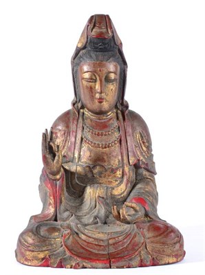 Lot 69 - A Chinese Polychrome, Gilt and Carved Wood Figure of Buddha, in Ming style, seated in long...